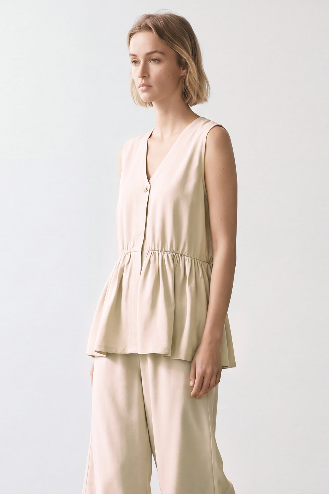 KOKO Silky Linen Peplum Top