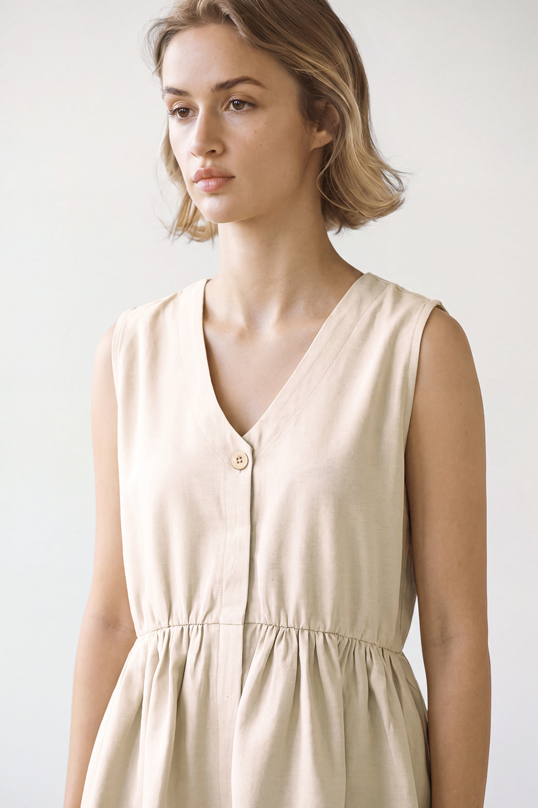 KOKO Silky Linen Peplum Top